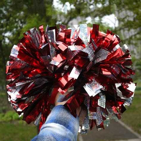 big cheerleading pom poms|professional cheerleader pom poms.